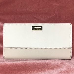S O L D new kate spade cream almond wallet “stacy”